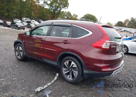 2016 Honda Cr-V Touring z USA, uszkodzony, nr VIN 5J6RM3H93GL001713